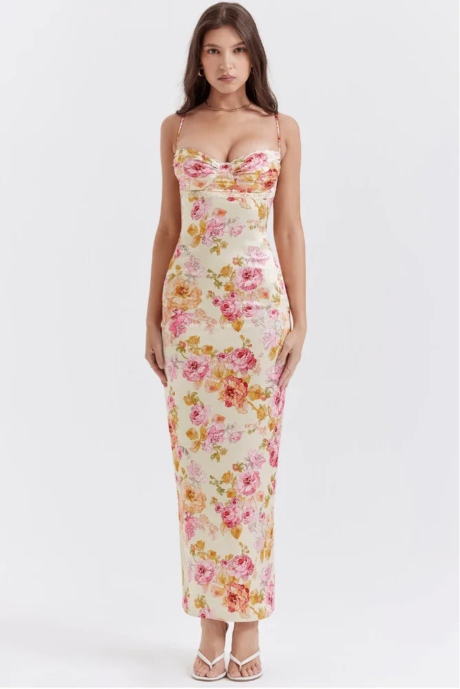 Yellow floral maxi dress with sparkling details on a charming design, perfect for summer.
