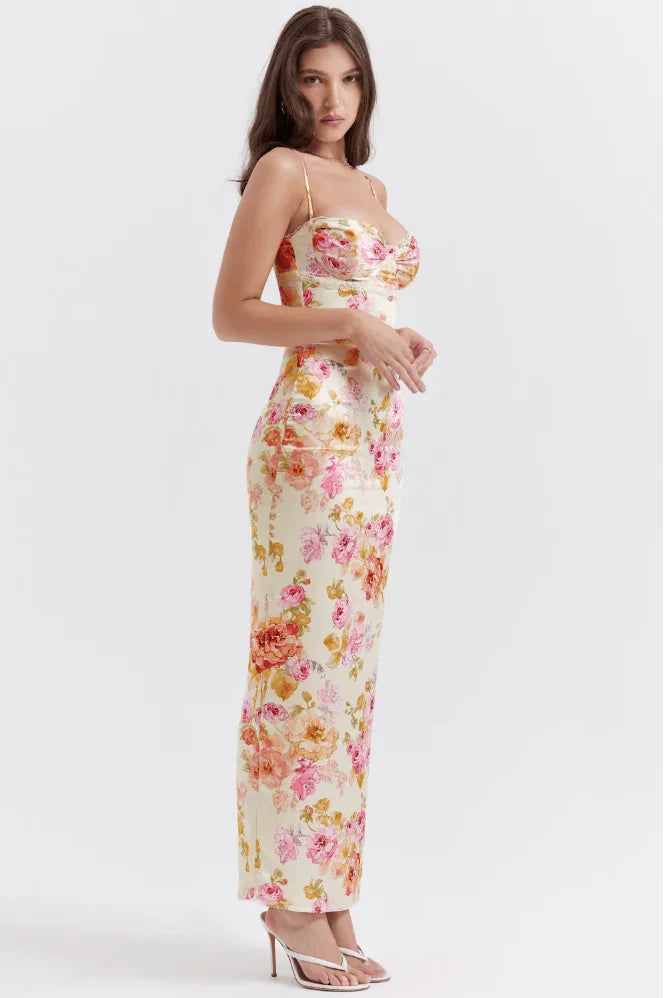 Yellow floral maxi dress with sparkling embellishments, perfect for a charming look.