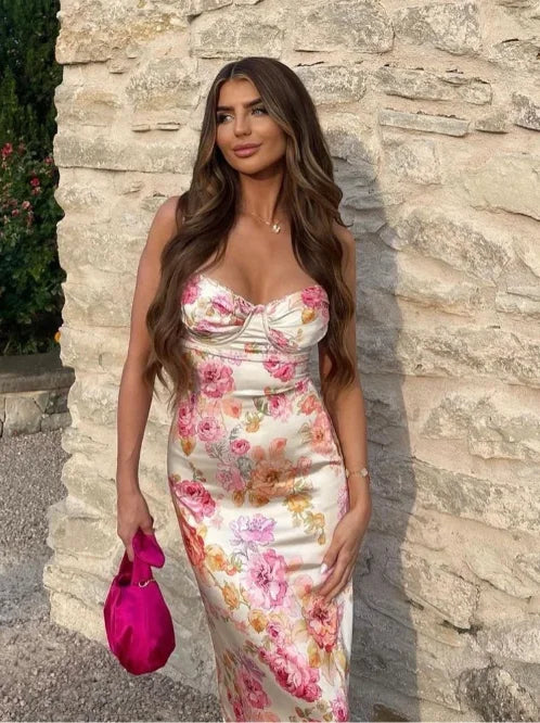 Yellow floral maxi dress with subtle sparkle detail, exuding charm. Made from lightweight, airy fabric perfect for warm…