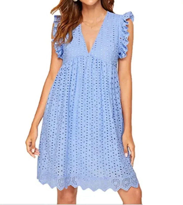 Light blue eyelet mini dress with V-neck, showcasing a flowy design perfect for a breezy casual look.