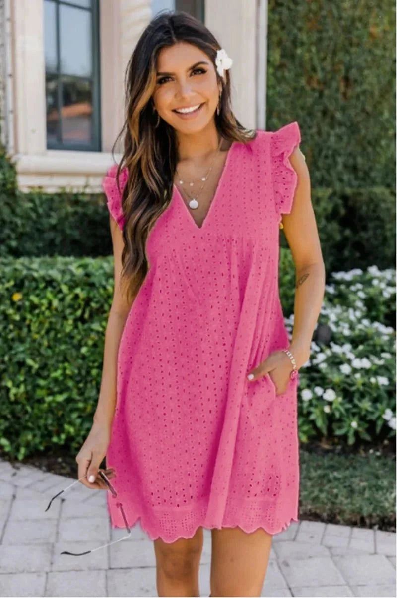 Red rose eyelet mini dress with V-neck made from flowy fabric. Feminine and elegant piece for any occasion.