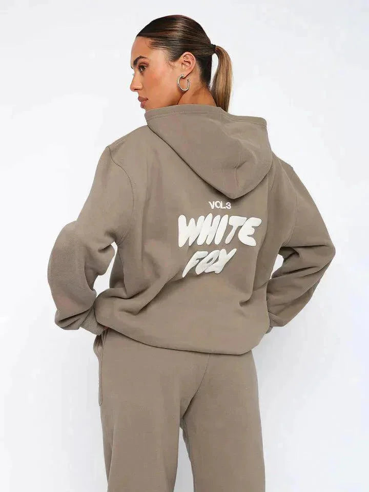 "Adelynne two-piece set featuring a soft hoodie and pants in a cozy design, perfect for casual days at home or on the go."