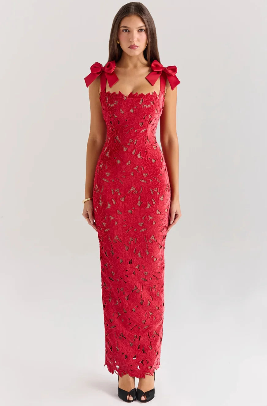 Sleeveless lace maxi dress with delicate bow accents in soft, breathable fabric for a charming, feminine look.