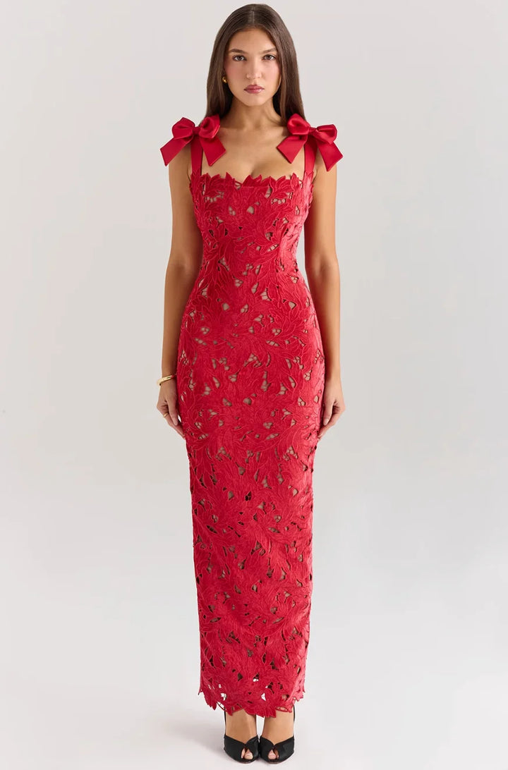 Sleeveless lace maxi dress with delicate bow accents in soft, breathable fabric for a charming, feminine look.