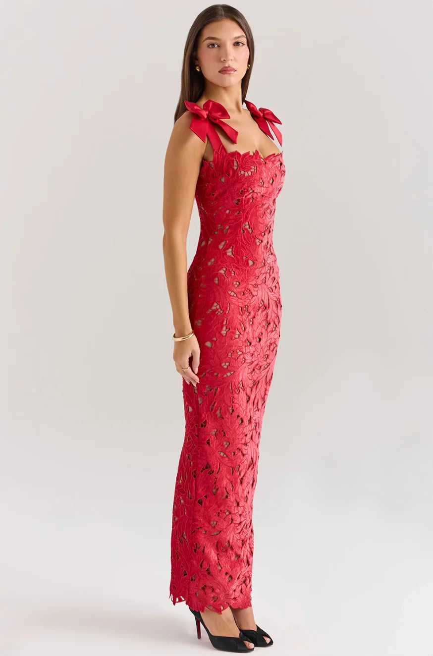 "Sleeveless lace maxi dress with bows, elegant design, perfect for special occasions."