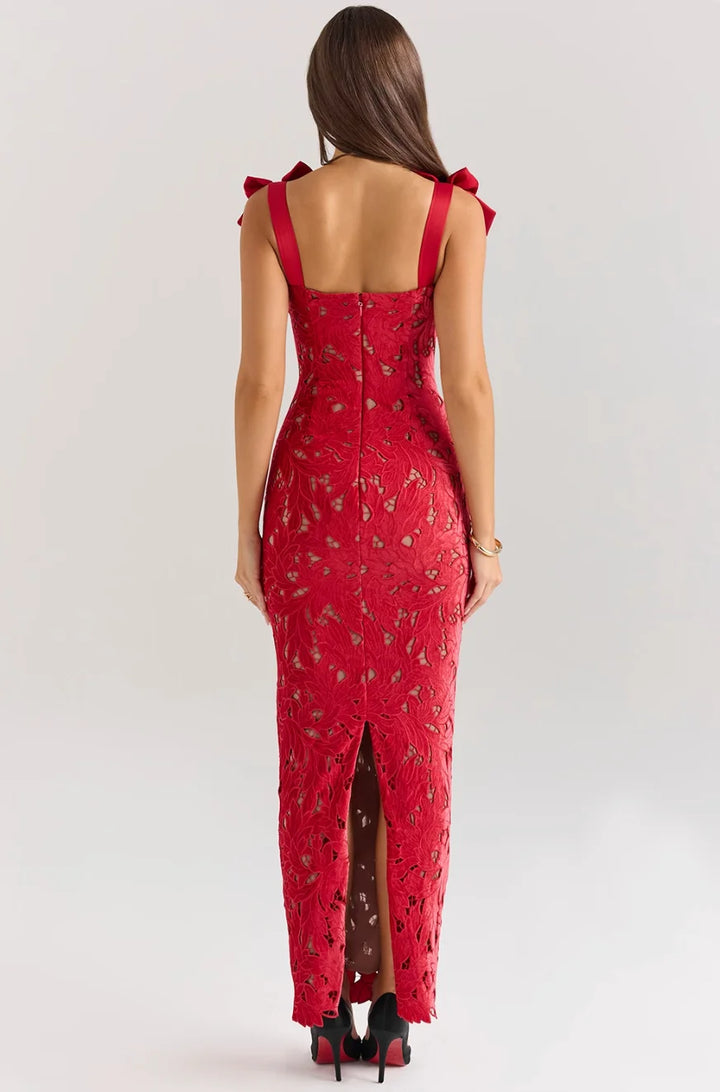 Sleeveless lace maxi dress with bows in soft fabric, perfect for any occasion.