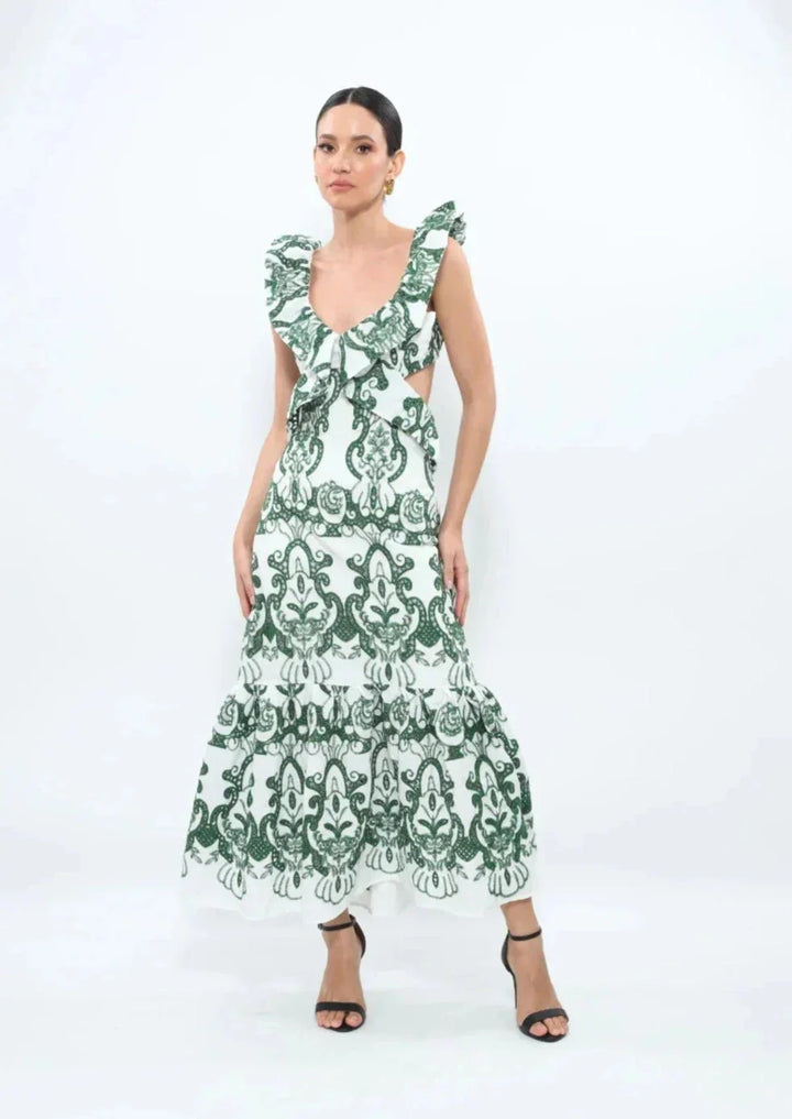 White and green ruffled maxi dress made of lightweight cotton blend, ideal for a charming and breezy summer look.
