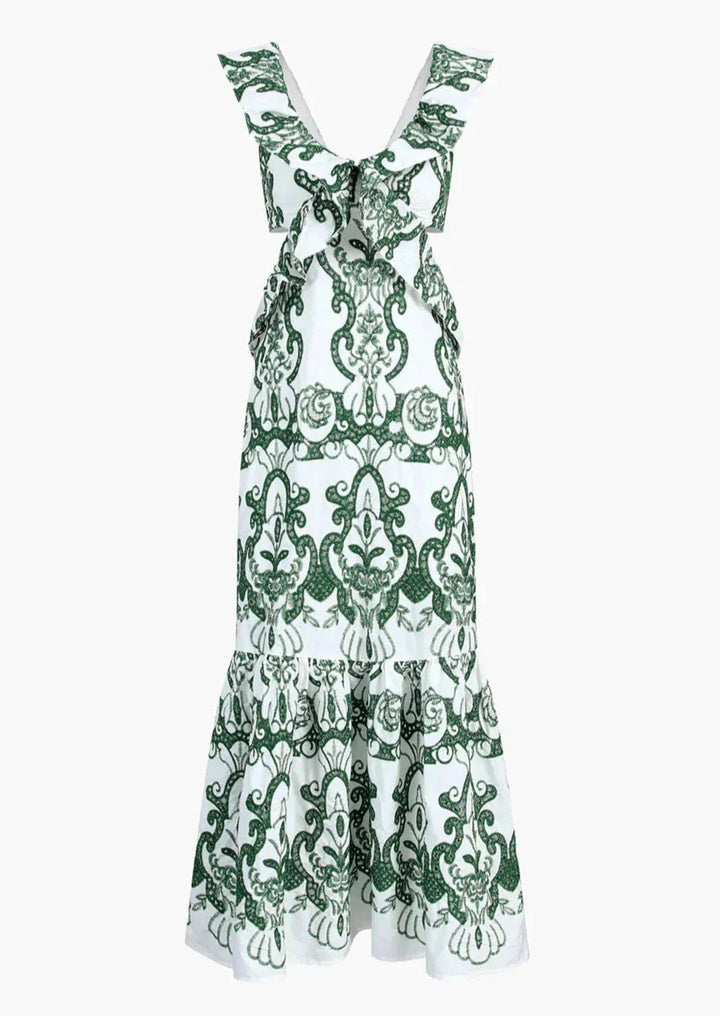 White and green ruffled maxi dress with a flowy design, made from lightweight breathable fabric perfect for a casual summer…
