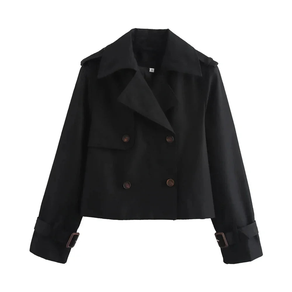Black double-breasted jacket with a cropped cut, perfect for year-round wear. Made from high-quality fabric with a tailored…