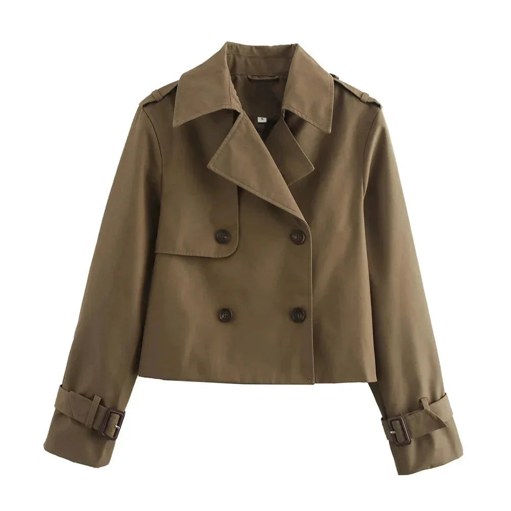 Brown cropped jacket with double-breasted design. Versatile year-round piece in a chic style, great for layering in any…