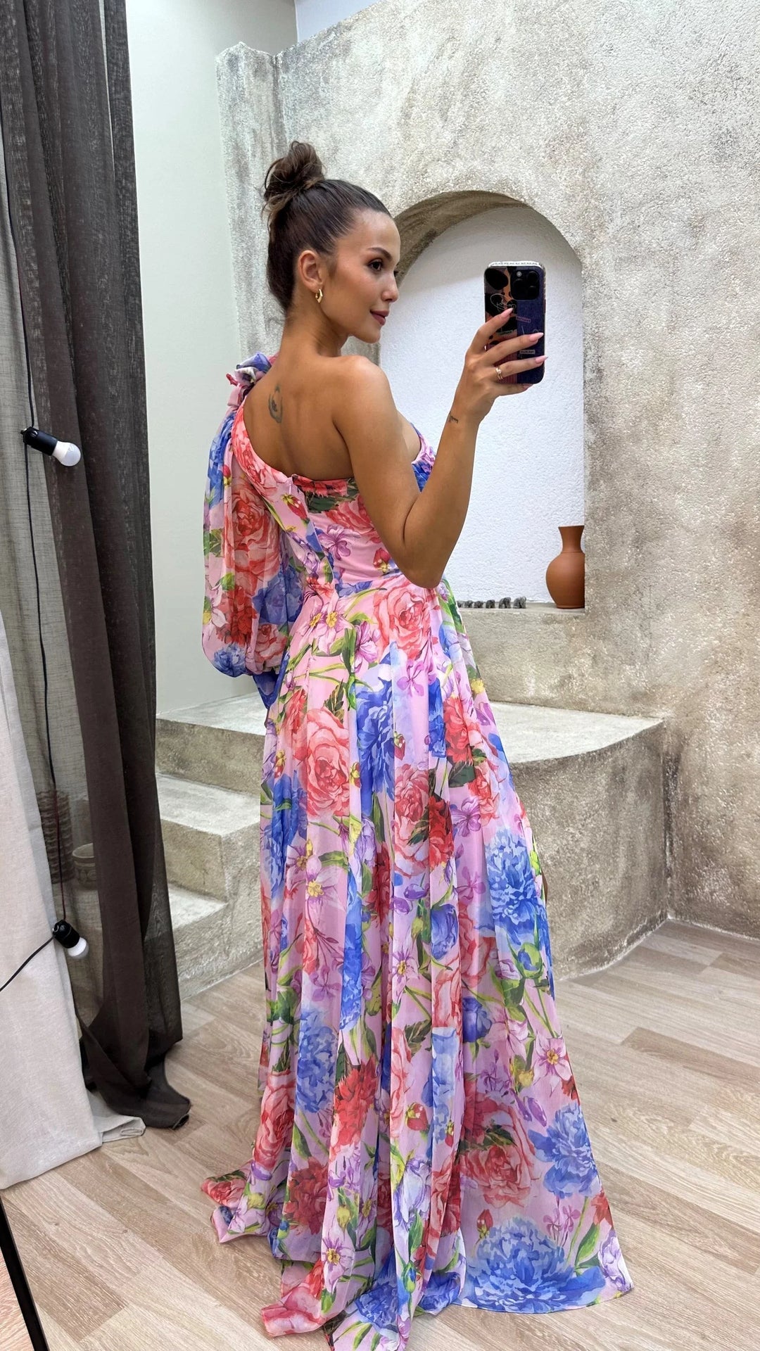 One-shoulder floral dress with flowy design, made of lightweight and breathable fabric, perfect for summer events or casual…