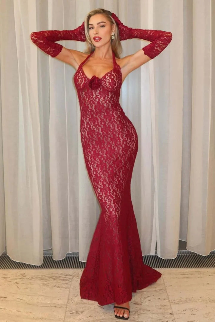 Red lace gown with halter neckline, featuring intricate floral lace design. Perfect for elegant evenings or special…