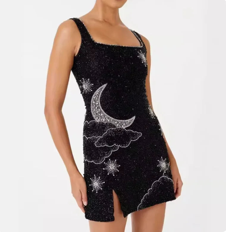 "Black sequin mini dress with side split, perfect for a night out. Glittering sequin fabric adds a touch of elegance. "