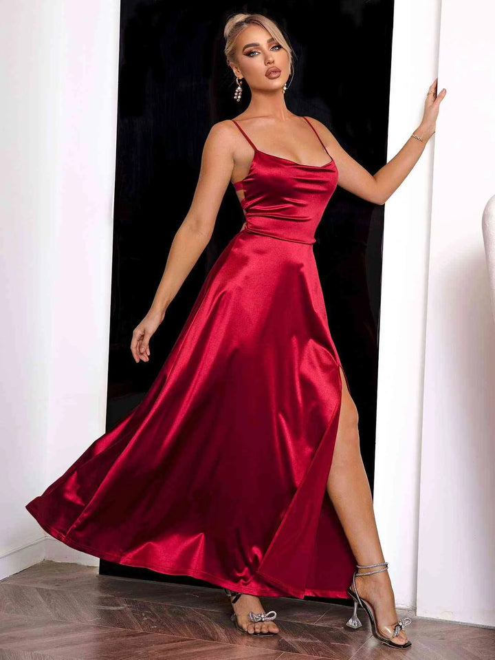 "Red satin maxi dress with spaghetti straps, a sleek and elegant design, perfect for special occasions."