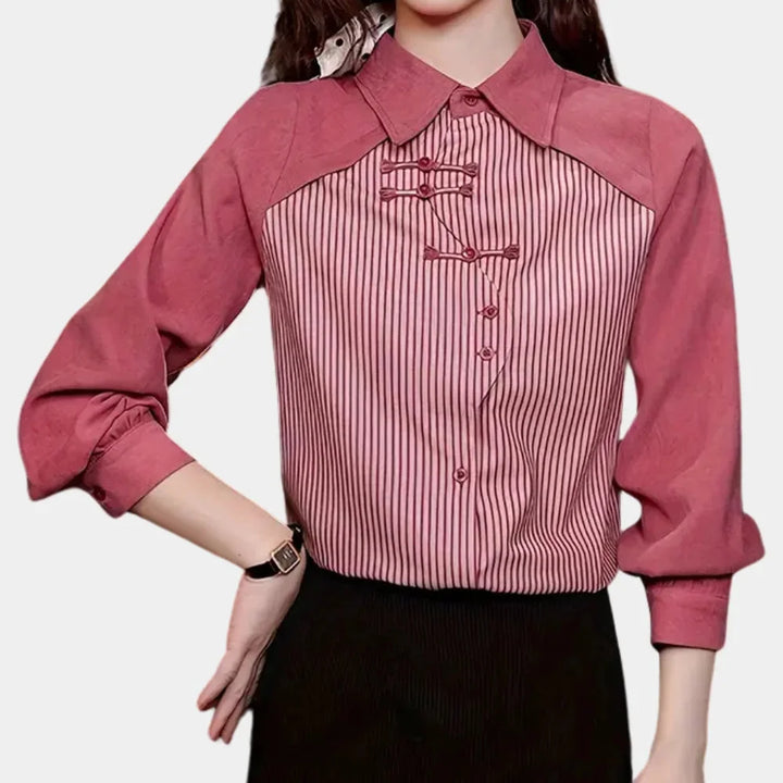 Pink striped blouse with contrast details in Red, made of soft, breathable fabric for a casual yet chic look.