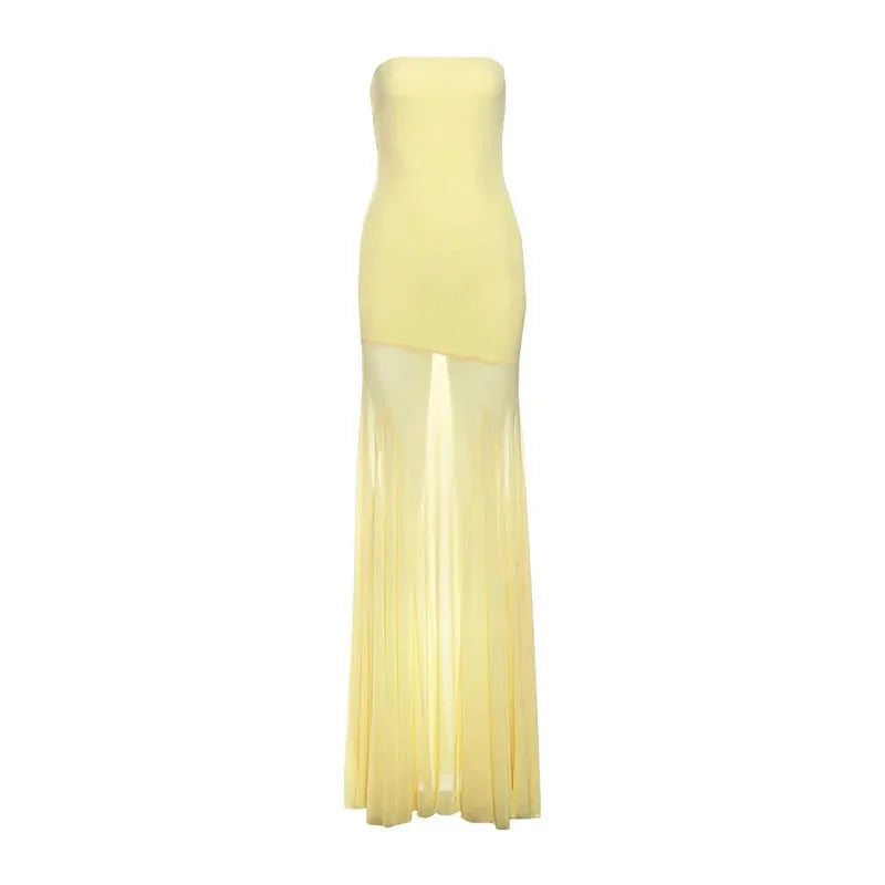 "Strapless maxi dress in yellow-to-beige ombre color gradient, perfect for summer events, made from lightweight and flowing…