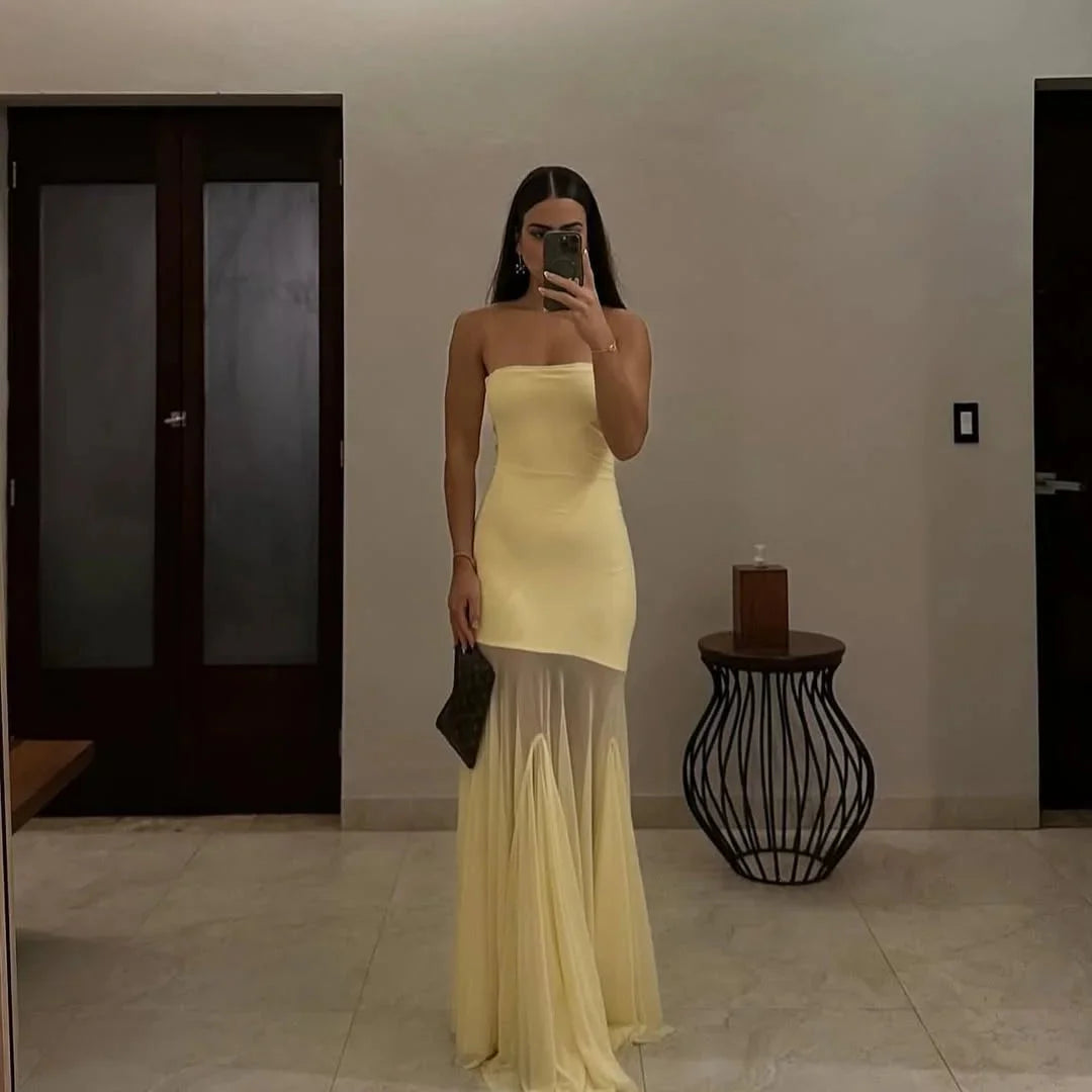 Strapless yellow-to-beige ombre maxi dress featuring gradient colors and flowing silhouette, perfect for sunny days.