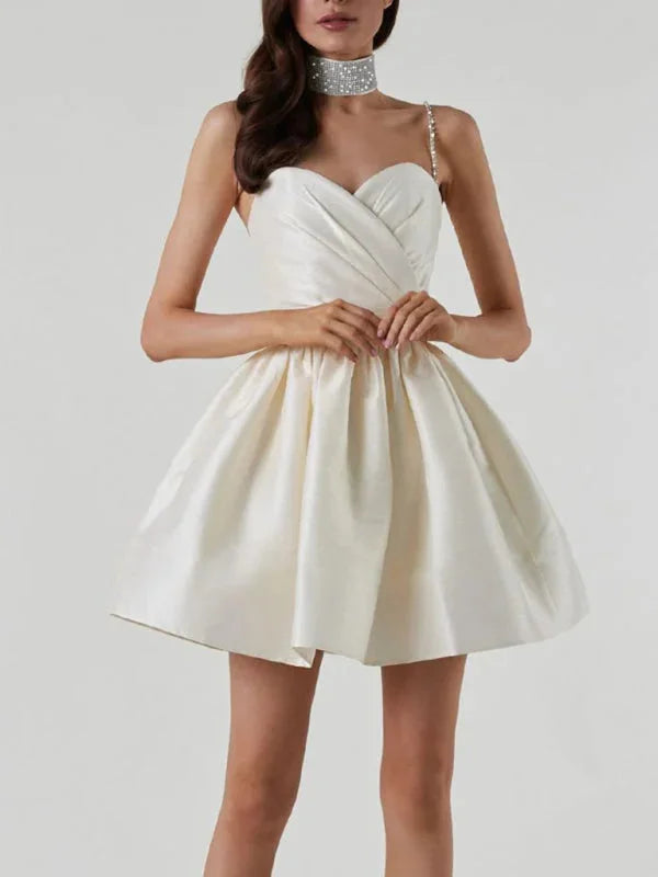 Satin mini dress with rhinestone strap in textured fabric - Alethea style.
