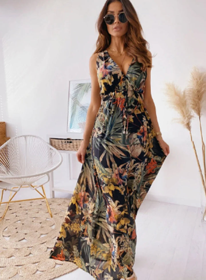 "Black sleeveless floral maxi dress made of lightweight fabric with a flattering silhouette for a stylish and elegant look."