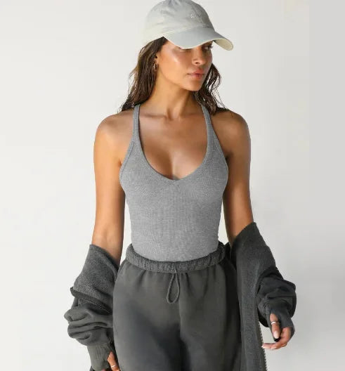 Light grey Alyna seamless athletic tank for active wear, featuring stretchy and breathable fabric for comfort during…
