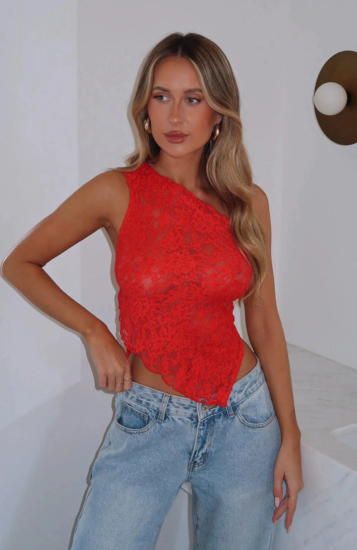 Red lace halter top for women, featuring intricate lace texture and halter neckline. Perfect blend of elegance and style.