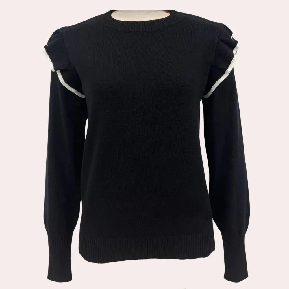 Grey crewneck sweater with delicate ruffle trim. Soft knit material and simple yet elegant design perfect for everyday wear.