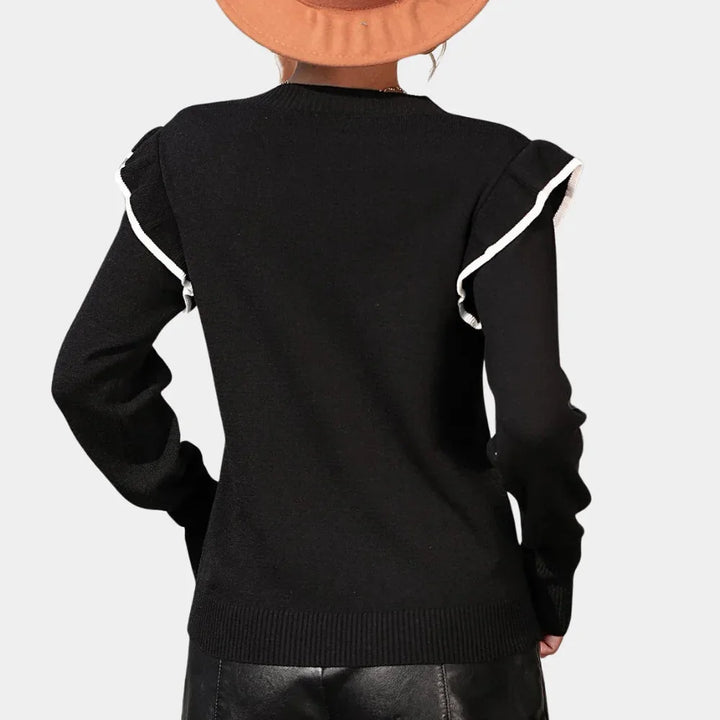 "Beige knit sweater with ruffle detailing on crewneck, stylish and cozy for fall and winter wear"