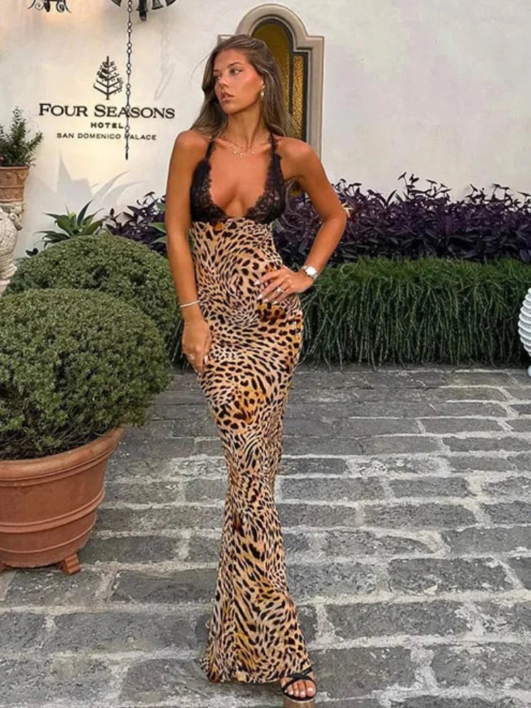 Leopard print maxi dress with plunging neckline, made of comfortable fabric, perfect for making a bold fashion statement.