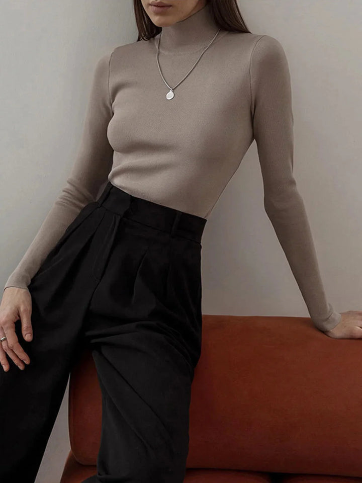 Amiracle seamless turtleneck in gray, ribbed knit fabric, high-neck design, perfect for layering or stand-alone outfit.