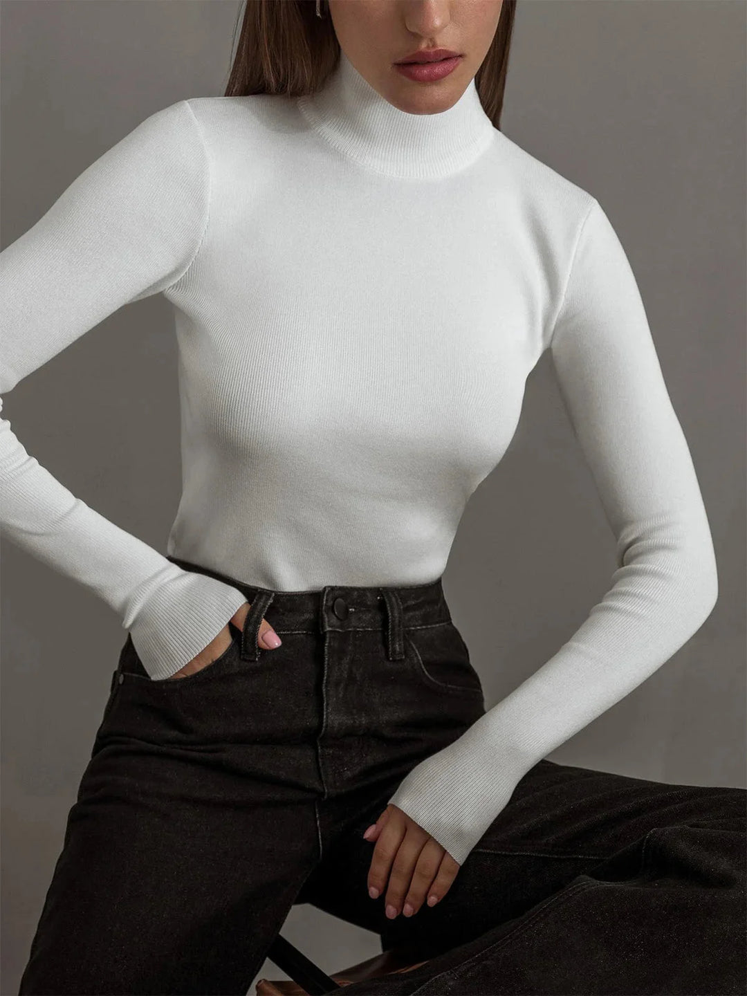 White seamless turtleneck made for versatile styling with a comfortable fit and sleek design by Amiracle.