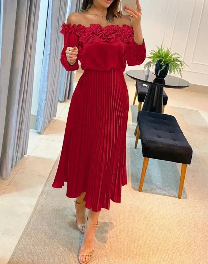 Off-shoulder red maxi dress with floral accents, made of lightweight fabric, perfect for a summer day out.