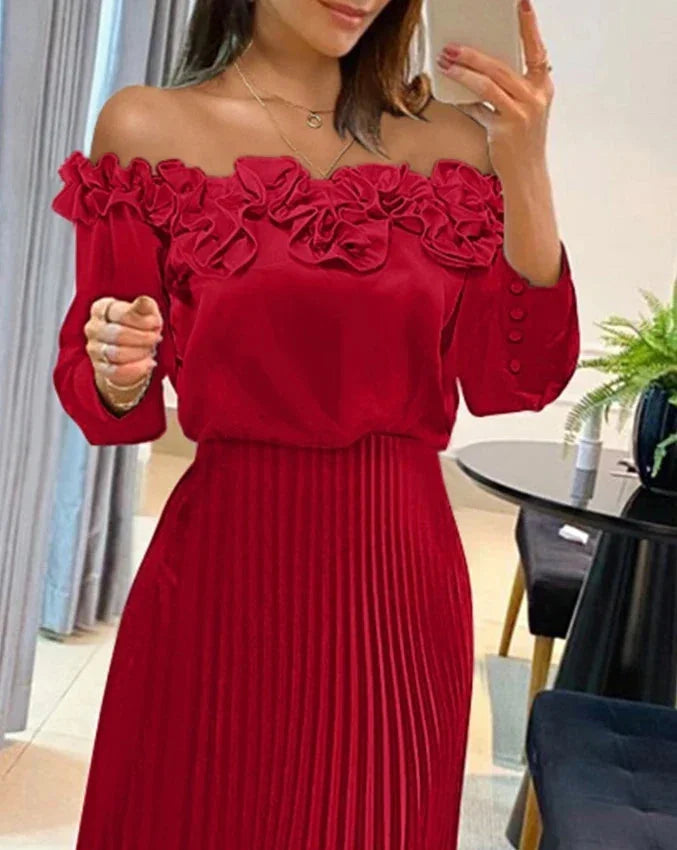 "Red off-shoulder maxi dress with floral accents in breathable cotton. Perfect for a summery day out or special occasion."