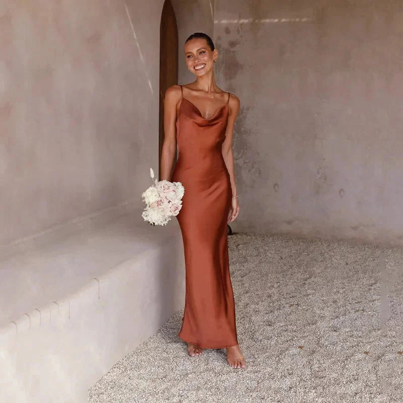 "Sleeveless brown maxi dress with cowl neckline, perfect for a casual yet sophisticated look"