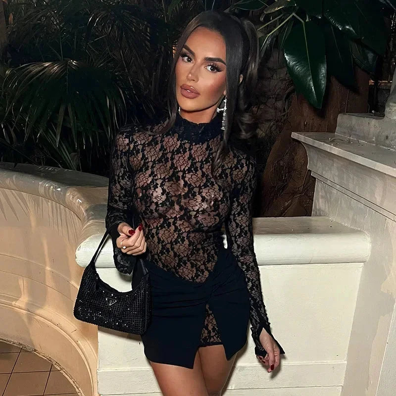 Black form-fitting mini dress with intricate lace detailing, perfect for a night out.