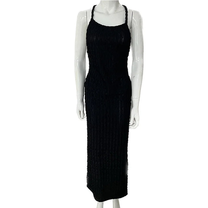 "Black lace maxi dress with body-hugging design for women, featuring intricate lace detailing - Andromeda collection."