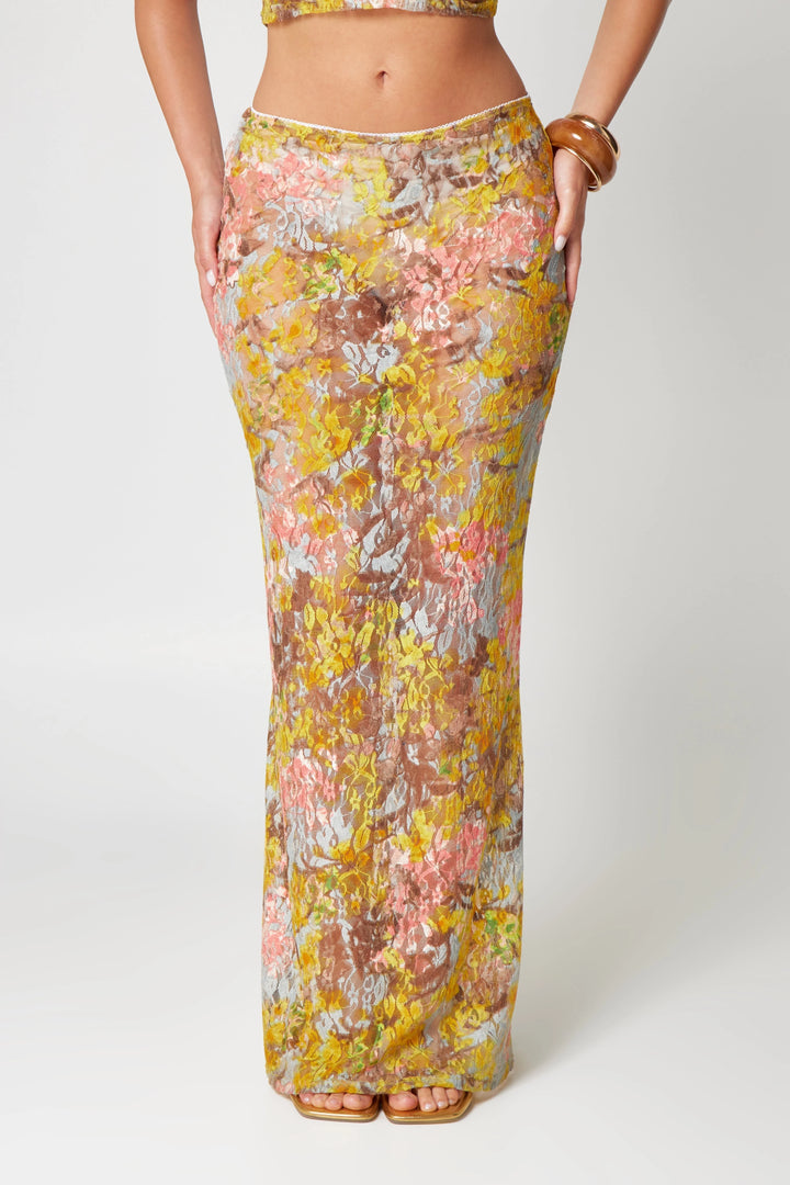 "Yellow floral print midi co-ord set, ideal for sunny days. Features intricate floral design on soft and breathable fabric."