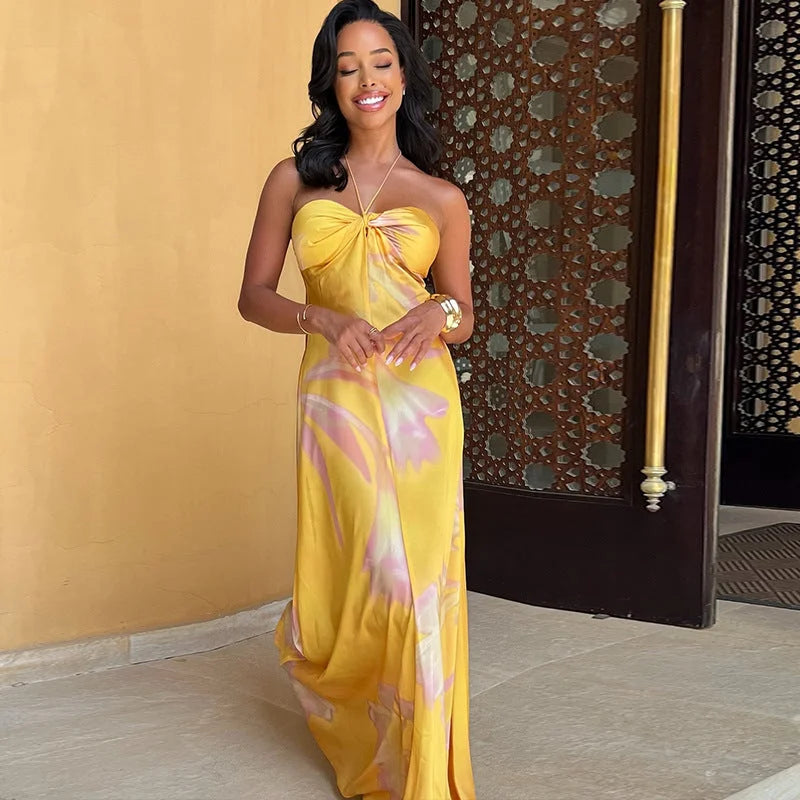 "Anisha - Strapless yellow floral maxi dress with a breezy design perfect for summer, featuring a vibrant print and flowy…