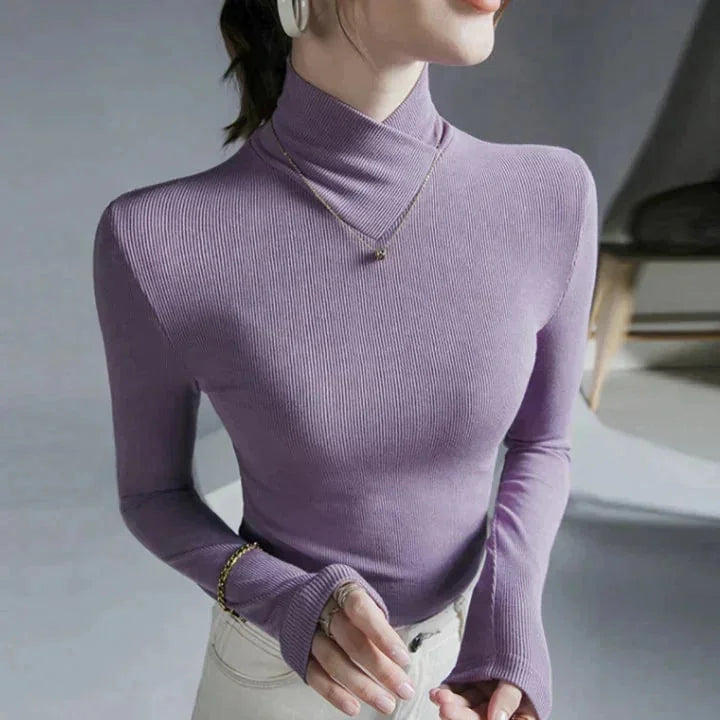 "Aniyah Seamless slim-fit high-collar top in Purple, made with stretchy and breathable fabric. Unique seamless design for a…