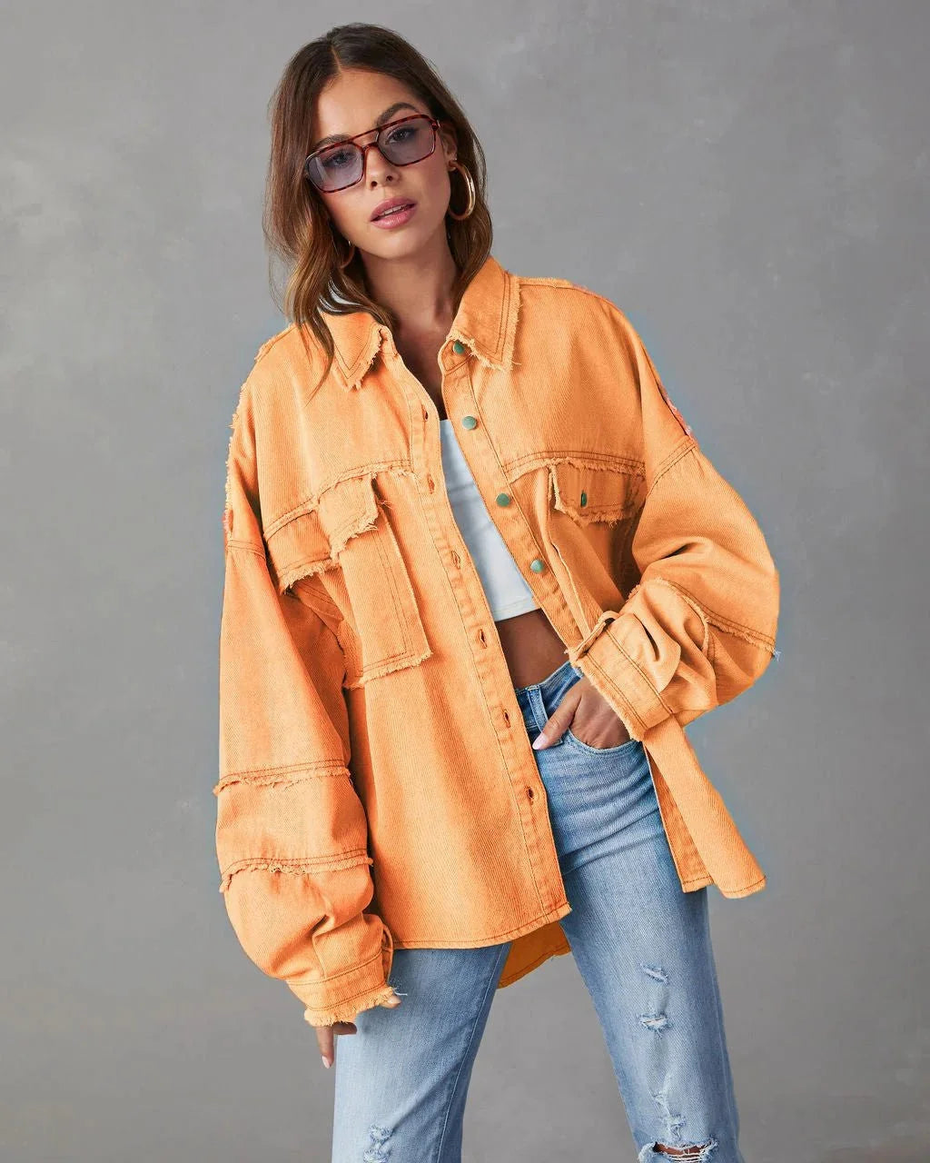 Cotton orange blouse with chest pockets, perfect for casual and chic looks.
