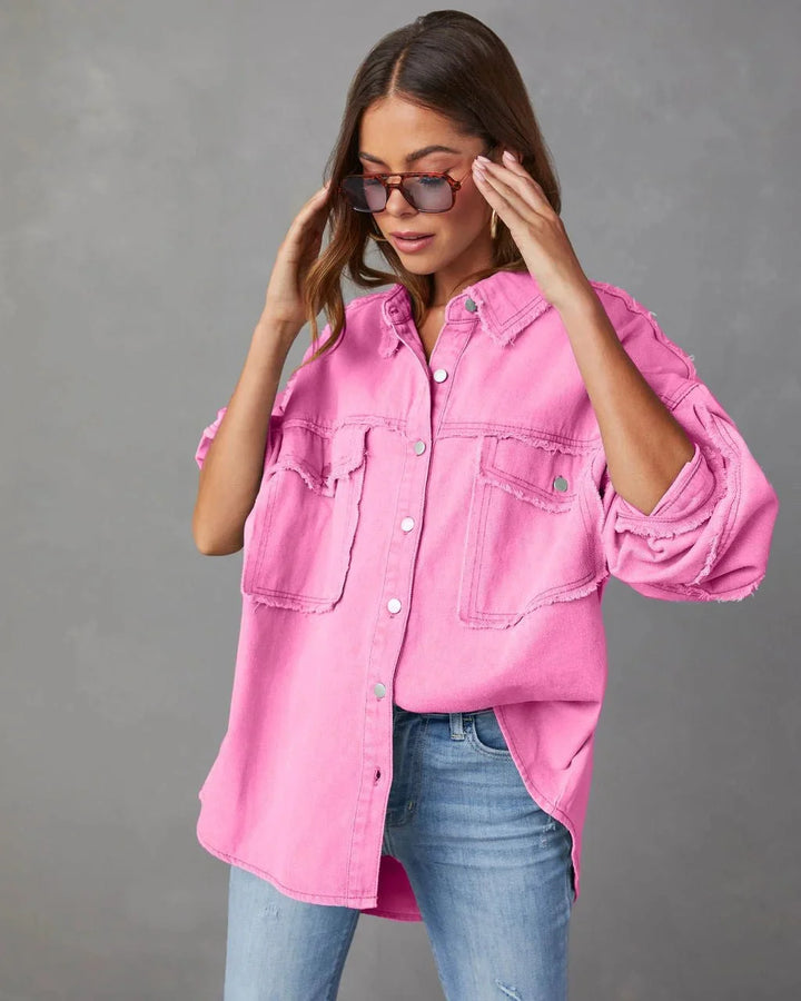 Pink cotton blouse with chest pockets, simple and elegant design perfect for everyday wear.