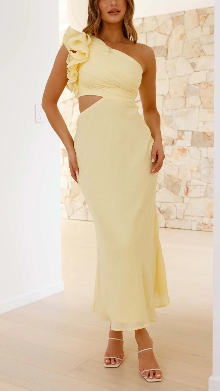 Yellow one-shoulder maxi dress with cutouts, perfect for summer. Made from flowy, breathable fabric for a chic and elegant…