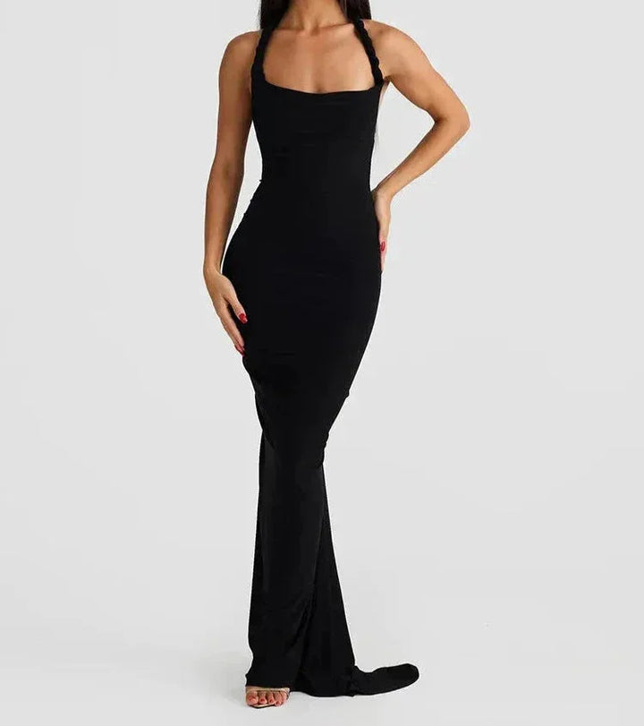 Slim-fit maxi dress with Spaghetti straps in soft and flowy fabric, perfect for a casual yet stylish look.