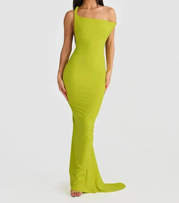 Slim-fit maxi dress with spaghetti straps in black cotton blend, perfect for casual outings or evening events.