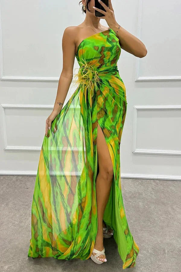 Strapless maxi dress in navy blue with delicate floral detailing, perfect for a summer outing or special occasion.
