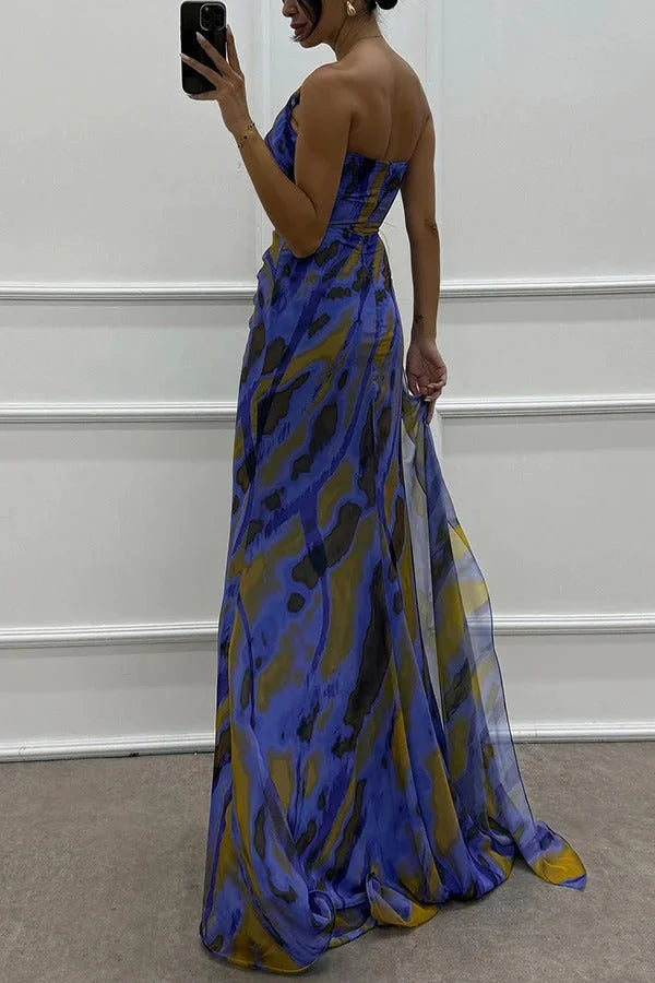 Strapless maxi dress in soft fabric with floral accent on the bodice - perfect for a summer day or special occasion.