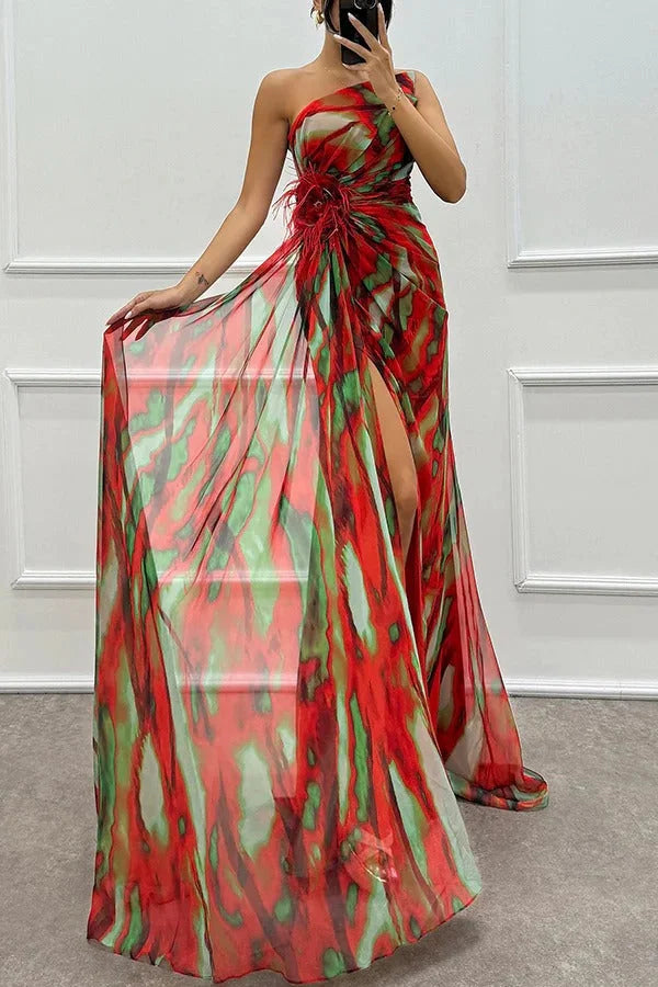Strapless maxi dress in navy blue with a floral accent, perfect for a summer day out.