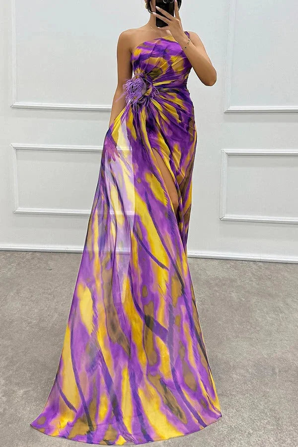 Strapless maxi dress in a vibrant floral print design, made with comfortable and flowy fabric for an effortlessly stylish…
