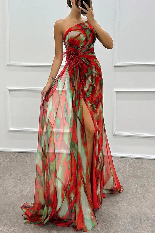 "Red strapless maxi dress with floral accent design, perfect for summer outings. Made from breathable and comfortable…