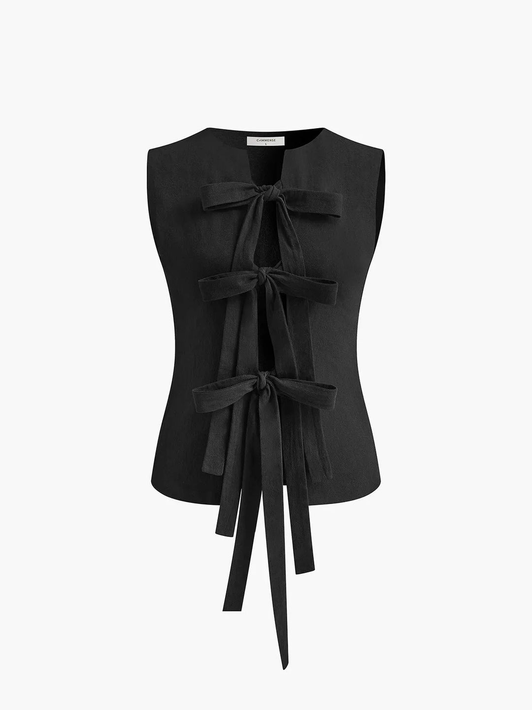 Sleeveless top in soft cotton blend with adjustable tie-back detail. Classic and versatile style for everyday wear.