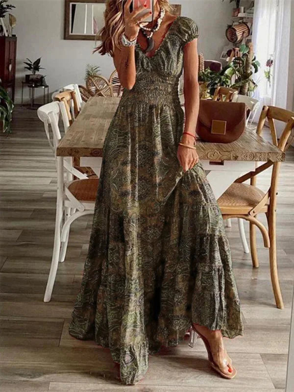 "Brown V-neck maxi dress with tiers in flowy bohemian style, perfect for a boho-chic look."